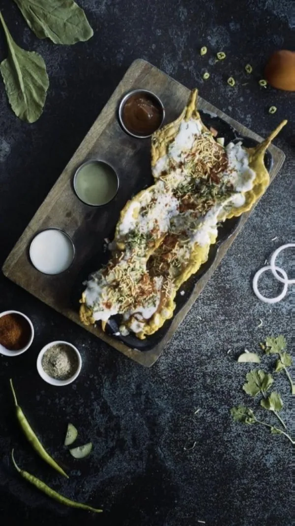 Dish reel: palak patta chaat, styled top-down with chutneys and spices.