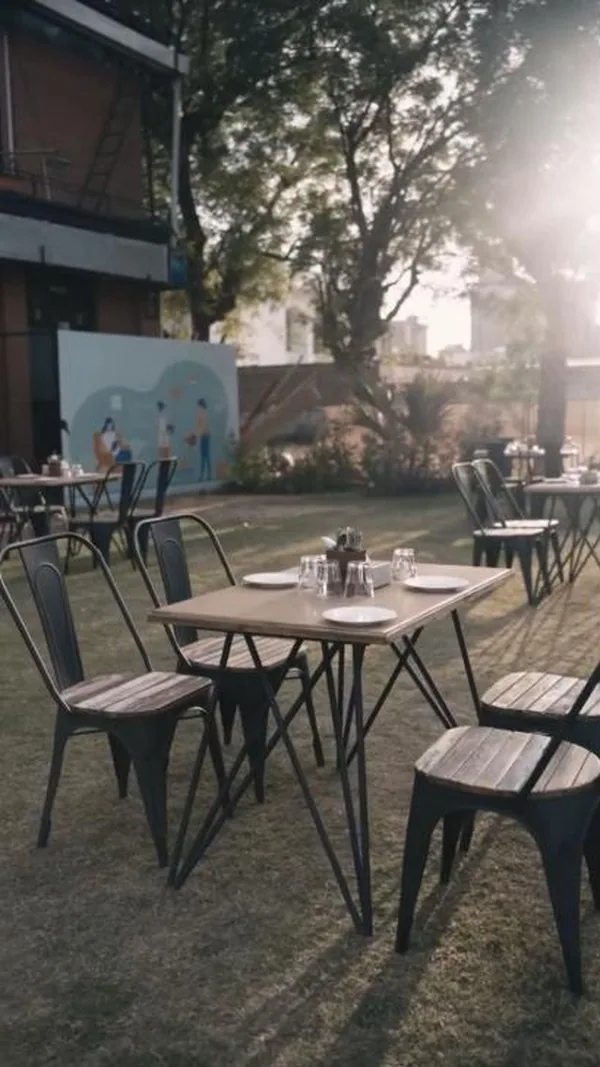 Party lawn showcase: golden-hour tables set out on the lawn at Toritos SBR.