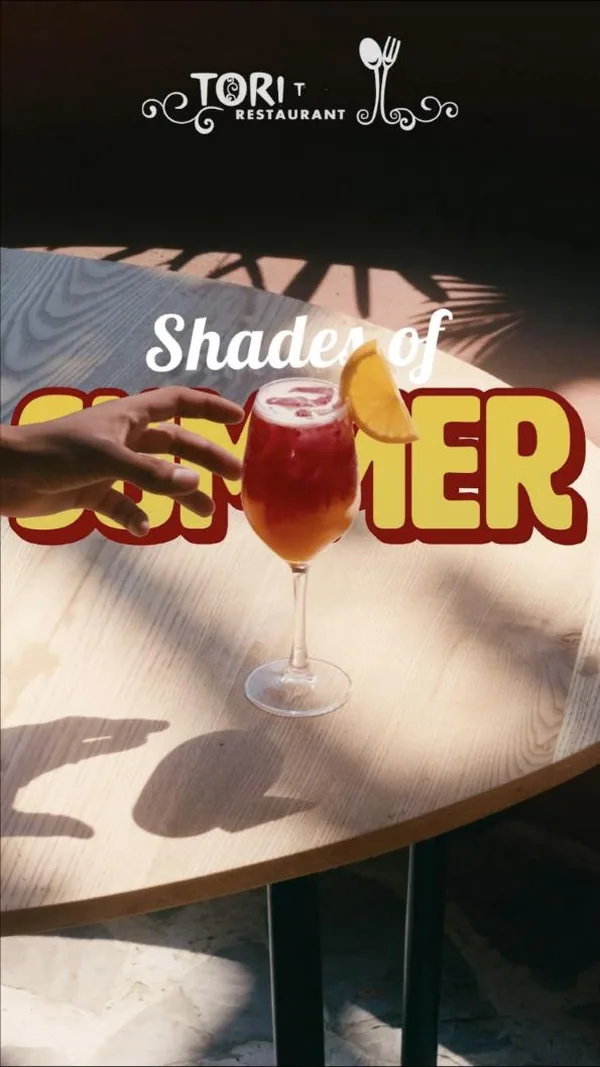 'Shades of summer': a sunlit mocktail reached for across the café table.