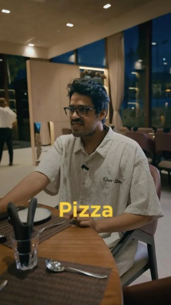 Pizza comedy: a diner learns the true value of a single slice.