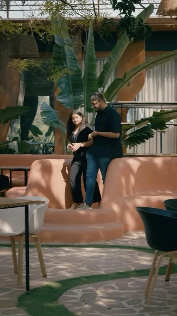 Valentine's film: a couple's quiet moment among the plants at Toritos.