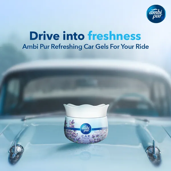 Banner: 'Drive into freshness' on the bonnet of a vintage car.
