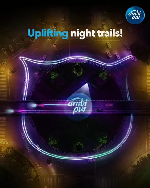 'Uplifting night trails!' The gel drawn in neon over a city road.