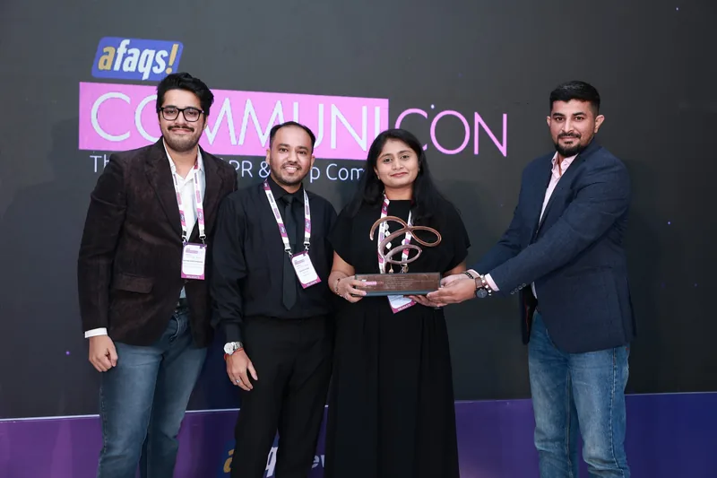 The Technoville team on stage with the Bronze trophy at the afaqs! Communicon Awards 2026