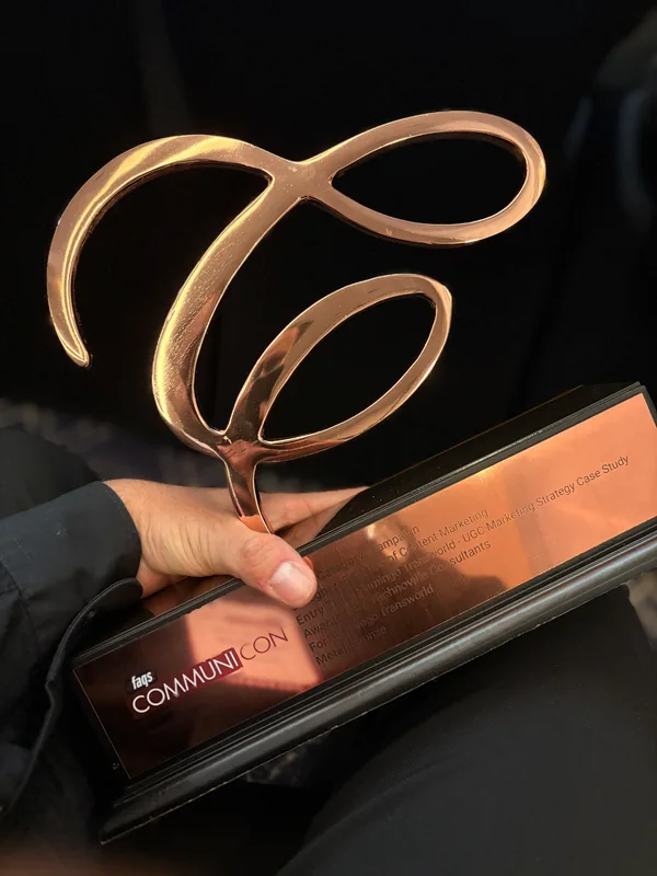 The copper Communicon trophy and its plaque